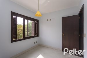 Casa em Condomínio à venda com 179m², 3 dormitórios, 1 suíte, 2 vagas, no bairro Tristeza em Porto Alegre