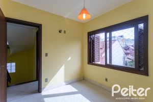 Casa em Condomínio à venda com 179m², 3 dormitórios, 1 suíte, 2 vagas, no bairro Tristeza em Porto Alegre
