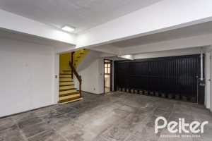 Casa em Condomínio à venda com 179m², 3 dormitórios, 1 suíte, 2 vagas, no bairro Tristeza em Porto Alegre