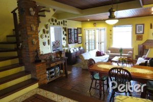 Casa em Condomínio à venda com 198m², 3 dormitórios, 1 suíte, 2 vagas, no bairro Tristeza em Porto Alegre