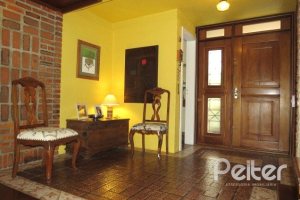 Casa em Condomínio à venda com 198m², 3 dormitórios, 1 suíte, 2 vagas, no bairro Tristeza em Porto Alegre