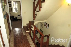 Casa em Condomínio à venda com 198m², 3 dormitórios, 1 suíte, 2 vagas, no bairro Tristeza em Porto Alegre