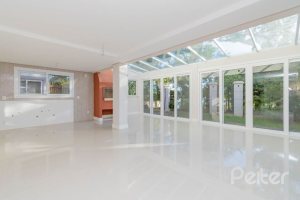 Casa em Condomínio à venda com 343m², 3 dormitórios, 3 suítes, 3 vagas, no bairro Tristeza em Porto Alegre