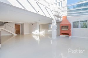 Casa em Condomínio à venda com 343m², 3 dormitórios, 3 suítes, 3 vagas, no bairro Tristeza em Porto Alegre
