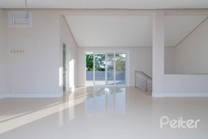 Casa em Condomínio à venda com 343m², 3 dormitórios, 3 suítes, 3 vagas, no bairro Tristeza em Porto Alegre