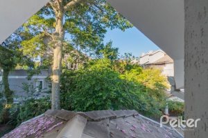 Casa em Condomínio à venda com 343m², 3 dormitórios, 3 suítes, 3 vagas, no bairro Tristeza em Porto Alegre