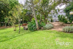 Casa em Condomínio à venda com 343m², 3 dormitórios, 3 suítes, 3 vagas, no bairro Tristeza em Porto Alegre