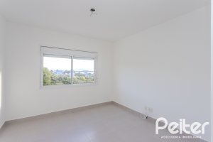 Apartamento à venda com 74m², 2 dormitórios, 1 suíte, 2 vagas, no bairro Tristeza em Porto Alegre