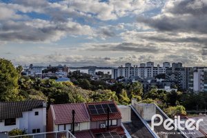 Apartamento à venda com 74m², 2 dormitórios, 1 suíte, 2 vagas, no bairro Tristeza em Porto Alegre