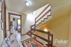 Casa em Condomínio à venda com 293m², 3 dormitórios, 1 suíte, 2 vagas, no bairro Tristeza em Porto Alegre