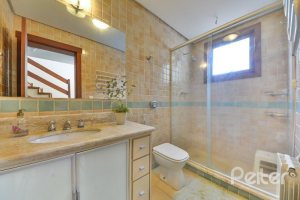 Casa em Condomínio à venda com 293m², 3 dormitórios, 1 suíte, 2 vagas, no bairro Tristeza em Porto Alegre
