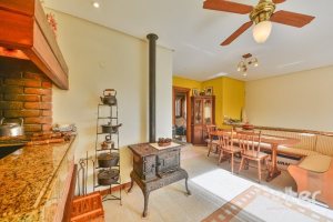 Casa em Condomínio à venda com 293m², 3 dormitórios, 1 suíte, 2 vagas, no bairro Tristeza em Porto Alegre