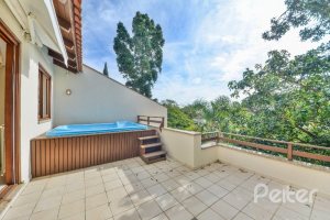 Casa em Condomínio à venda com 293m², 3 dormitórios, 1 suíte, 2 vagas, no bairro Tristeza em Porto Alegre