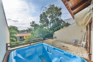 Casa em Condomínio à venda com 293m², 3 dormitórios, 1 suíte, 2 vagas, no bairro Tristeza em Porto Alegre