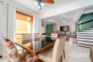 Casa em Condomínio à venda com 168m², 3 dormitórios, 1 suíte, 3 vagas, no bairro Tristeza em Porto Alegre