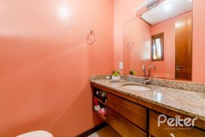 Casa em Condomínio à venda com 168m², 3 dormitórios, 1 suíte, 3 vagas, no bairro Tristeza em Porto Alegre