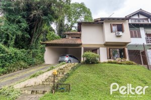 Casa à venda com 124m², 3 dormitórios, 1 suíte, 2 vagas, no bairro Jardim Isabel em Porto Alegre