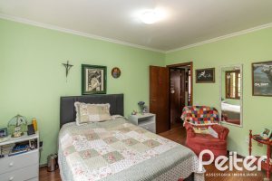 Casa à venda com 124m², 3 dormitórios, 1 suíte, 2 vagas, no bairro Jardim Isabel em Porto Alegre