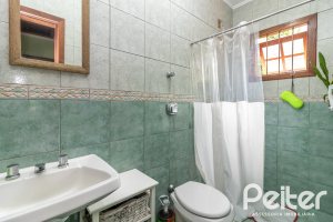 Casa à venda com 124m², 3 dormitórios, 1 suíte, 2 vagas, no bairro Jardim Isabel em Porto Alegre