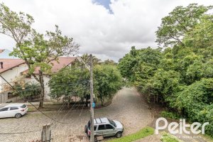 Casa à venda com 124m², 3 dormitórios, 1 suíte, 2 vagas, no bairro Jardim Isabel em Porto Alegre