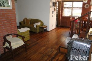 Casa à venda com 242m², 4 dormitórios, 1 suíte, 3 vagas, no bairro Tristeza em Porto Alegre