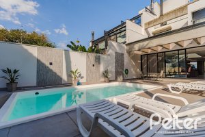 Casa à venda com 380m², 4 dormitórios, 4 suítes, 4 vagas, no bairro Vila Assunção em Porto Alegre