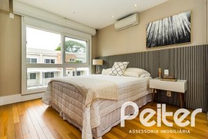 Casa em Condomínio à venda com 191m², 4 dormitórios, 1 suíte, 2 vagas, no bairro Vila Nova em PORTO ALEGRE