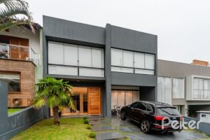 Casa em Condomínio à venda com 250m², 3 dormitórios, 3 suítes, 3 vagas, no bairro Hipica em PORTO ALEGRE