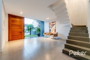 Casa em Condomínio à venda com 250m², 3 dormitórios, 3 suítes, 3 vagas, no bairro Hipica em PORTO ALEGRE