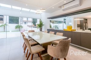 Casa em Condomínio à venda com 250m², 3 dormitórios, 3 suítes, 3 vagas, no bairro Hipica em PORTO ALEGRE