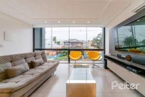 Casa em Condomínio à venda com 250m², 3 dormitórios, 3 suítes, 3 vagas, no bairro Hipica em PORTO ALEGRE