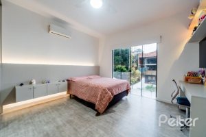 Casa em Condomínio à venda com 250m², 3 dormitórios, 3 suítes, 3 vagas, no bairro Hipica em PORTO ALEGRE
