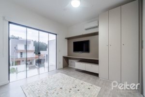 Casa em Condomínio à venda com 250m², 3 dormitórios, 3 suítes, 3 vagas, no bairro Hipica em PORTO ALEGRE