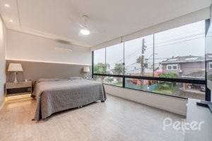 Casa em Condomínio à venda com 250m², 3 dormitórios, 3 suítes, 3 vagas, no bairro Hipica em PORTO ALEGRE