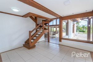 Casa em Condomínio à venda com 348m², 4 dormitórios, 2 suítes, 4 vagas, no bairro Terra Ville em PORTO ALEGRE