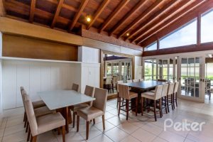 Casa em Condomínio à venda com 348m², 4 dormitórios, 2 suítes, 4 vagas, no bairro Terra Ville em PORTO ALEGRE