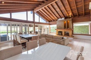 Casa em Condomínio à venda com 348m², 4 dormitórios, 2 suítes, 4 vagas, no bairro Terra Ville em PORTO ALEGRE