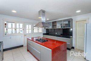 Casa em Condomínio à venda com 348m², 4 dormitórios, 2 suítes, 4 vagas, no bairro Terra Ville em PORTO ALEGRE