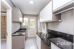 Casa em Condomínio à venda com 348m², 4 dormitórios, 2 suítes, 4 vagas, no bairro Terra Ville em PORTO ALEGRE