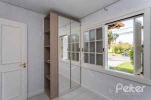 Casa em Condomínio à venda com 348m², 4 dormitórios, 2 suítes, 4 vagas, no bairro Terra Ville em PORTO ALEGRE