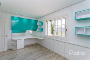 Casa em Condomínio à venda com 348m², 4 dormitórios, 2 suítes, 4 vagas, no bairro Terra Ville em PORTO ALEGRE