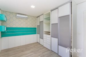 Casa em Condomínio à venda com 348m², 4 dormitórios, 2 suítes, 4 vagas, no bairro Terra Ville em PORTO ALEGRE