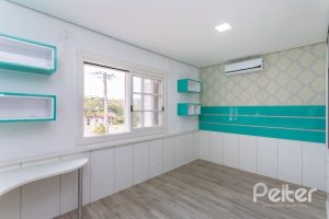 Casa em Condomínio à venda com 348m², 4 dormitórios, 2 suítes, 4 vagas, no bairro Terra Ville em PORTO ALEGRE