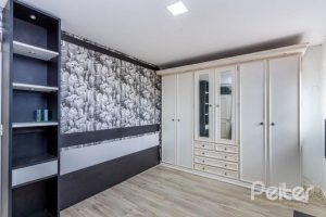 Casa em Condomínio à venda com 348m², 4 dormitórios, 2 suítes, 4 vagas, no bairro Terra Ville em PORTO ALEGRE