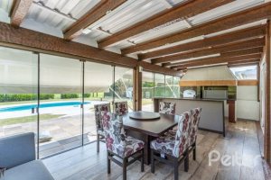 Casa em Condomínio à venda com 348m², 4 dormitórios, 2 suítes, 4 vagas, no bairro Terra Ville em PORTO ALEGRE