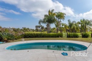 Casa em Condomínio à venda com 348m², 4 dormitórios, 2 suítes, 4 vagas, no bairro Terra Ville em PORTO ALEGRE