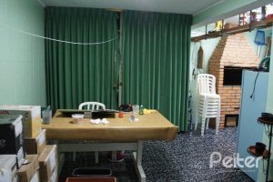 Casa à venda com 248m², 3 dormitórios, 1 suíte, 4 vagas, no bairro Tristeza em Porto Alegre
