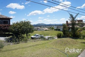 Casa em Condomínio à venda com 288m², 3 dormitórios, 3 suítes, 4 vagas, no bairro Terra Ville em PORTO ALEGRE