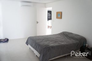 Casa em Condomínio à venda com 288m², 3 dormitórios, 3 suítes, 4 vagas, no bairro Terra Ville em PORTO ALEGRE
