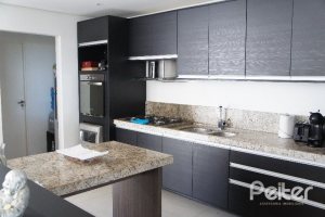 Casa em Condomínio à venda com 288m², 3 dormitórios, 3 suítes, 4 vagas, no bairro Terra Ville em PORTO ALEGRE